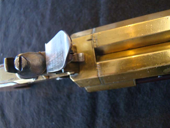 A RARE English Brass Double Cannon Barrel Flintlock Pistol with spring bayonet by Dawes, London, circa 1790. — image 3